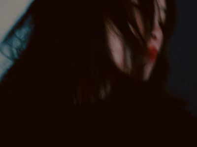 Blurred motion shot of a person moving through a sequence.